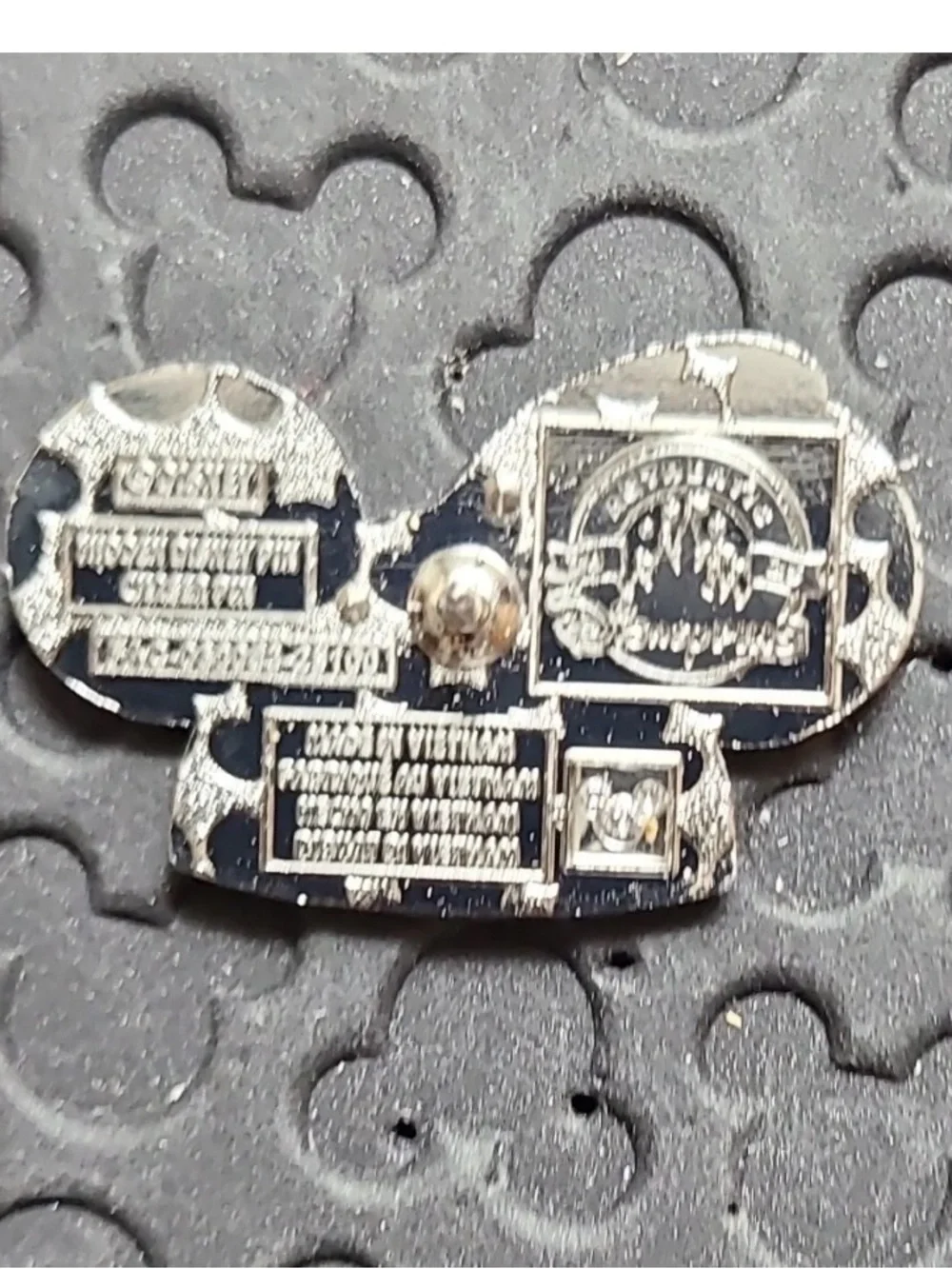 Disney brooch featuring